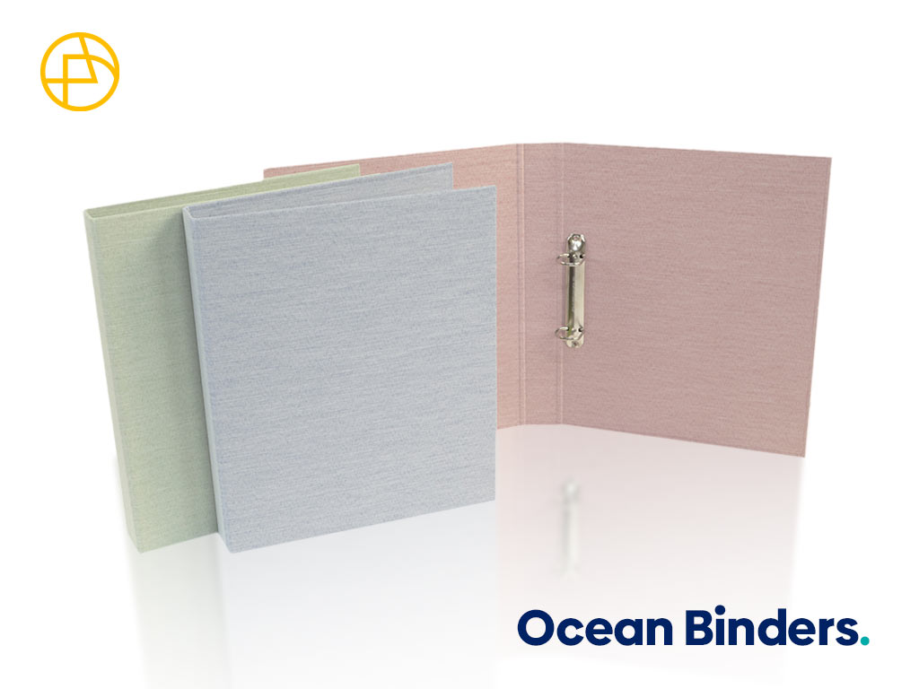 Three binders in pastel colours